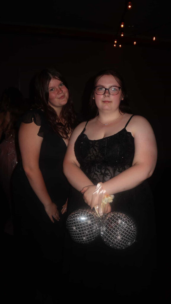 this is a photo of me and my friend Jenna going to prom together as friends.